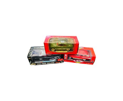 3 BOXED LARGER SCALE MODEL CARS 