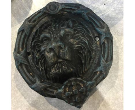 Lions head door knocker 