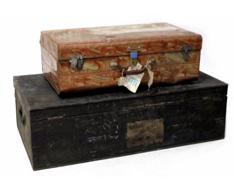 An early 20th century metal trunk with lettering to top, length 77cm, an early 20th century metal suitcase with various trave