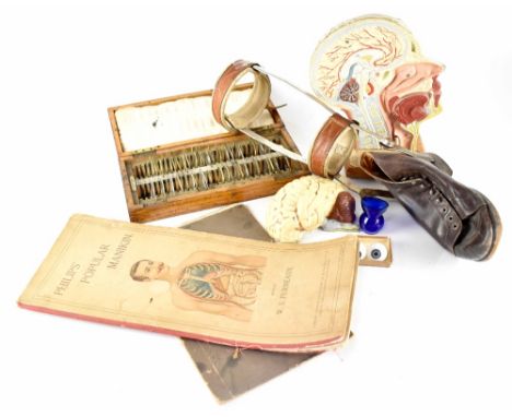 A quantity of medical related items to include a copy of 'Philips' Popular Manikin' edited by WS Furneaux, published in Londo