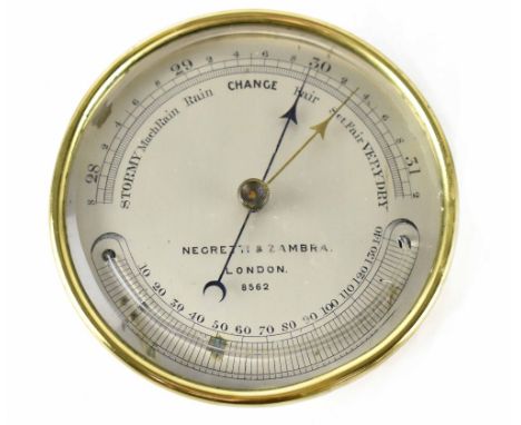 A Negretti &amp; Zambra ship's barometer, the silvered dial numbered 8562, with weather conditions and mercury scale to dial,