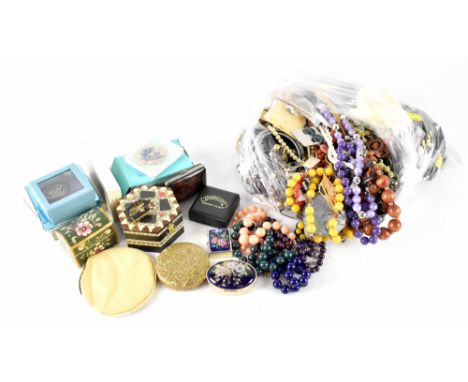 A large quantity of costume jewellery to include coin bracelet, necklaces, fashion rings, modern card-backed earrings, vintag