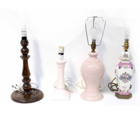 Four various modern table lamps including a turned wooden Chinese-style example and two pale pink ceramic examples (4).