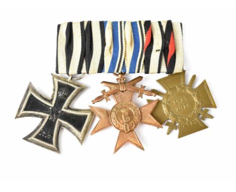 Geman WWI medals to include an Iron Cross Second Class, Bavarian Bronze Cross of Merit with swords and a Cross of Honour with