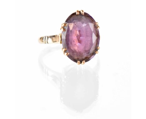 A 9ct gold amethyst ring, the oval cut claw-set amethyst on 9ct gold shank, size R, approx 5.2g. CONDITION REPORT Amethyst 16