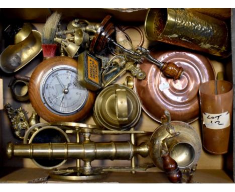 A quantity of metalware to include copper warming pan, large brass bell, ornamental sounding cannon, an early 20th century br