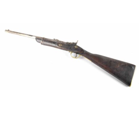 A British Snider Enfield carbine .577 obsolete calibre, the 49cm sight of barrel with ladder rear sights, lock plate stamped 