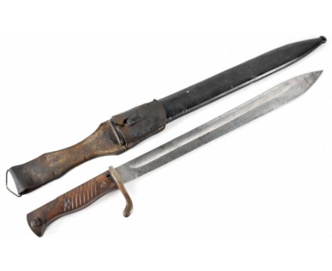 A German WWI butcher bayonet with scabbard.