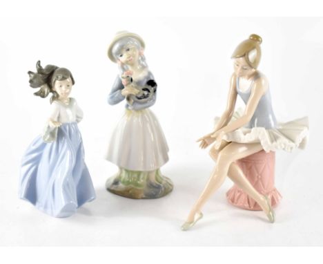 Two Nao figures, seated ballerina and young girl with flowing robes and hair blowing in the wind and a similar Tenora figure 