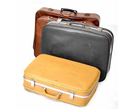 Four vintage suitcases to include two Spartanite examples and a yellow hard case example (4).