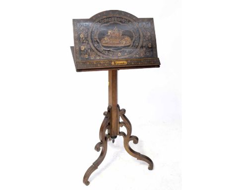 A late 19th/early 20th century Italian Sorrento ware walnut and marquetry music stand, the adjustable music rest inlaid with 