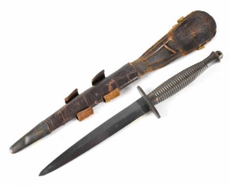 A third pattern FS fighting knife and scabbard. CONDITION REPORT It has been re-tipped, badly fitting scabbard.