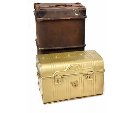 An early 20th century wood and canvas brass-bound travel trunk, length 84cm and a similar period later gold painted metal dom