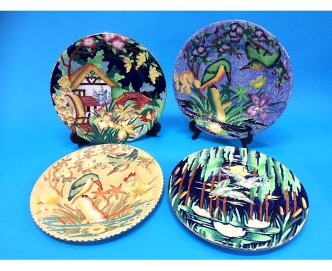 A group of four Maling plates
