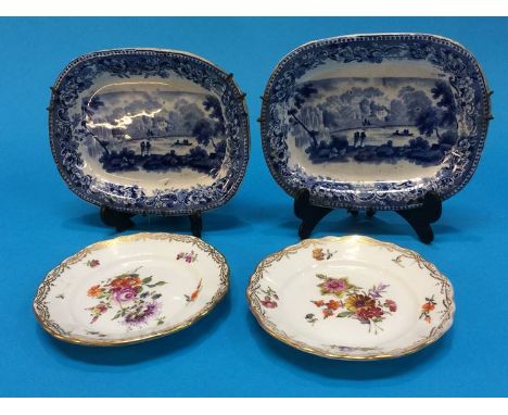 Pair of 'Dresden' hand decorated saucers and a pair of matching mini blue and white meat plates