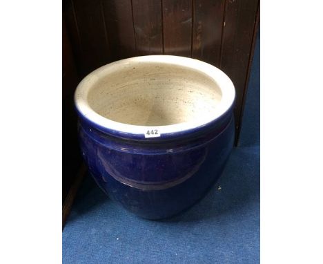 A large blue planter