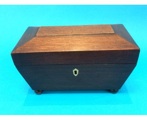 A mahogany Sarcophagus shaped tea caddy