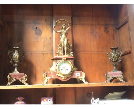 A Continental marble and gilt mantle clock and garniture