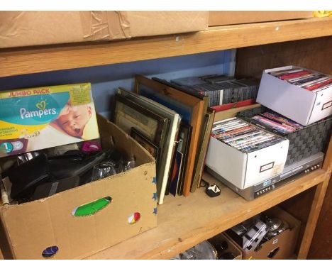 Shelf of assorted, DVDs, pictures and china etc.