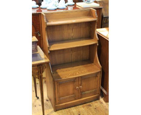 Ercol Golden Dawn waterfall cabinet bookcase