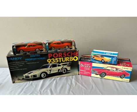 PERIOD ALFA-ROMEO, FIAT, PORSCHE FRICTION AND RADIO-CONTROLLED CARS  Porsche 935 Turbo by Tandy (1:12 scale), boxed and with 