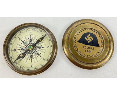 A replica German WWII screw top brass cased compass commemorating the 20 July Plot failed assassination. Approx. 7.75cm diame