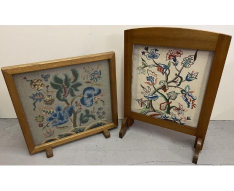 2 mid century light wood framed tapestry fire screens, one glazed. With floral designed panels. Tallest approx. 67cm tall. 