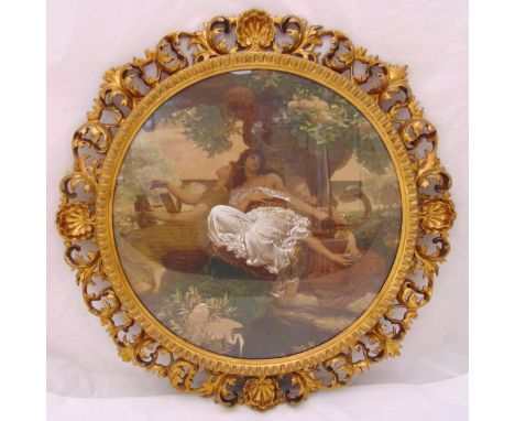 A circular polychromatic print of a reclining female within a gilded and pierced style picture frame, image 58.5cm (dia) fram