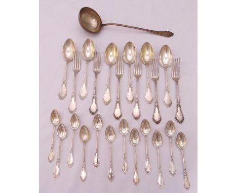 A quantity of continental white metal to include six table spoons, six forks, twelve teaspoons and a ladle, approx total weig