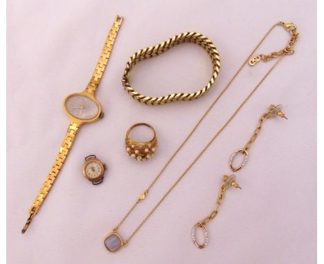 A quantity of costume jewellery to include earrings, a bracelet, a necklace, watches and a ring