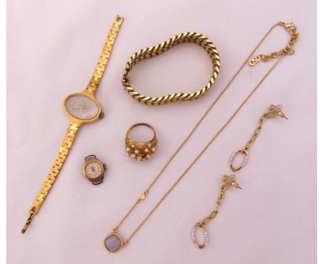 A quantity of costume jewellery to include earrings, a bracelet, a necklace, watches and a ring