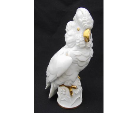 Rosenthal figurine of a parrot, with gilded beak, eyes and claws, marks to the base, A/F