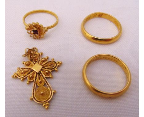 A quantity of gold jewellery to include a crucifix and three rings, tested 18ct, approx total weight 12.9g (one ring A/F)