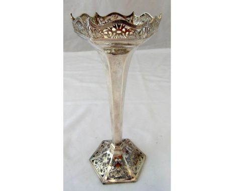 A hallmarked silver vase, tapering hexagonal with scroll pierced top and hexagonal base, Sheffield 1912 by Walker and Hall, a