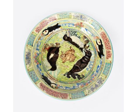 Maureen Minchin (born 1954) a large charger, painted to the well with three Razorbills and central roundel of two rabbits, th