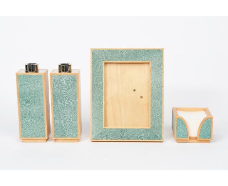 A Linley shagreen mounted desk set, comprising two candlesticks, with polished metal sconces, a photograph frame and a post-i