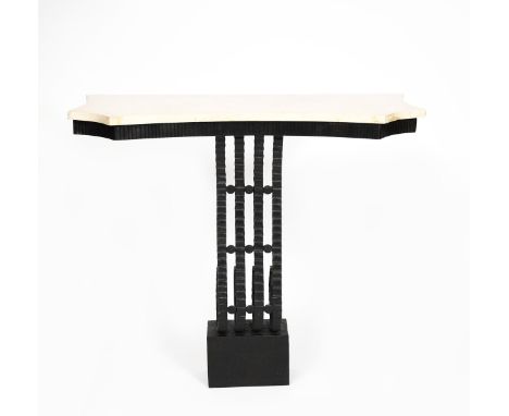 An Art Deco patinated wrought iron console table with white marble top in the manner of Edgar Brandt,  four scroll stems on s