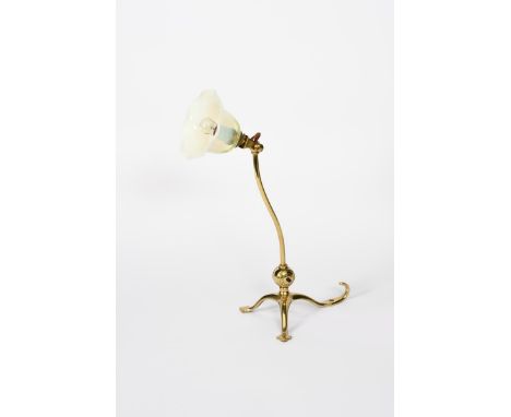 An early WAS Benson brass table or bracket wall light, model no.1211, tripod foot with foliate terminals, supporting articula