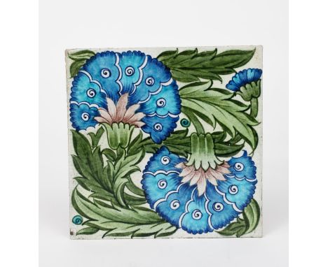 A William De Morgan Late Fulham Period Double Carnation large tile, painted with two large flowerheads in blue, aubergine and