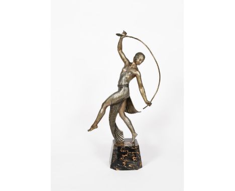 J D Guirande Thyrsus Dancer a large silvered bronze model of a dancing woman, holding a Thrysus branch, on flaring, veined bl