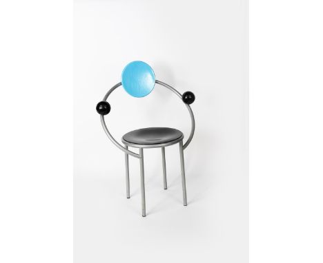 A Memphis  First chair designed by Michele De Lucchi,  tubular steel frame with painted wood panels, stamped Memphis mark and