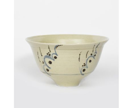 ‡David Leach OBE (1911-2005) a large porcelain bowl, painted with simple flower repeat in cobalt and Tenmoku on a pitted off-