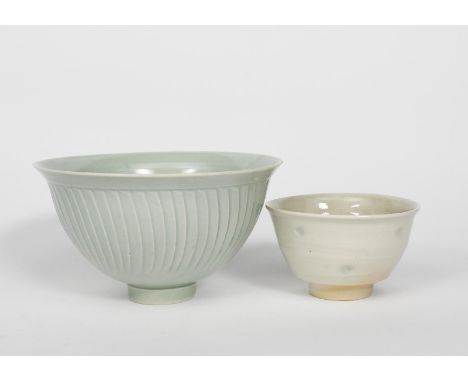 ‡David Leach OBE (1911-2005) a Lowerdown Pottery porcelain cut-sided bowl, covered in a pale blue celadon glaze, and another 