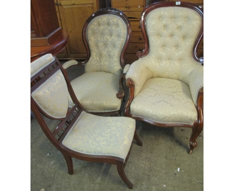 Victorian mahogany button back show frame fireside armchair on cabriole legs and casters. Together with a similar Victorian w