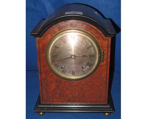 Early 20th Century burr walnut arched topped mantle clock, the case with stung inlaid decoration, having Roman brass face mar