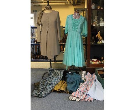 A box of vintage dresses (60's-80's) to include printed paisley sleeveless dress, blue shift dress, Laura Ashley velvet dress