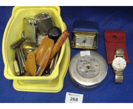 Assorted items to include; Midland Bank containing assorted coins, Ronson lighter, Limit wristwatch, assorted pocket knives, 