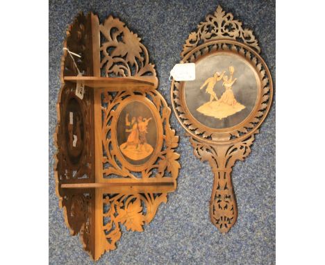 Late 19th/early 20th Century carved Sorrento mahogany lady's mirror, inlaid to the reverse with dancing figures, together wit