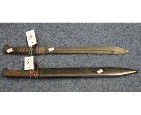 German WWI pioneer bayonet with saw backed fullered blades marked Waffenfabrik, Mouser A.G, Obendorf, together with German pi