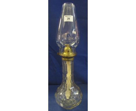Brass single burner bottle shaped lamp base with slice and thumb cut crystal glass reservoir and clear shade.(B.P. 24% incl. 